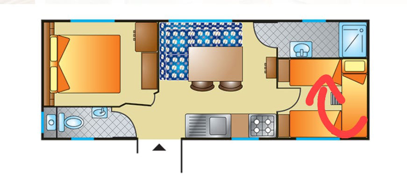 Plan d'appartement avec chambre, cuisine et salle de bain.